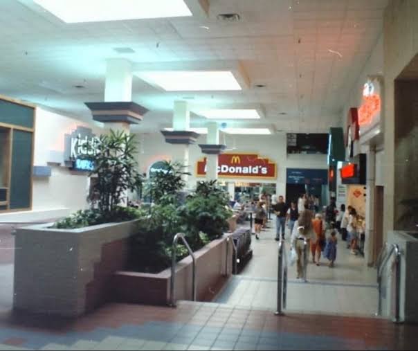 Stairs overlooking the arcade inside the food court at the former Paradise Valley Mall in Phoenix, Arizona with McDonalds.