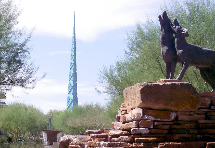 Frank Lloyd Wright inspired Scottsdale Monolith spire at the Scottsdale with coyotes and TLD USA.